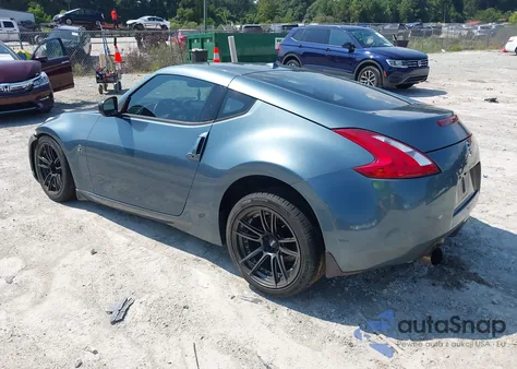2009 Nissan 370Z Touring z USA, uszkodzony, nr VIN JN1AZ44E09M403640